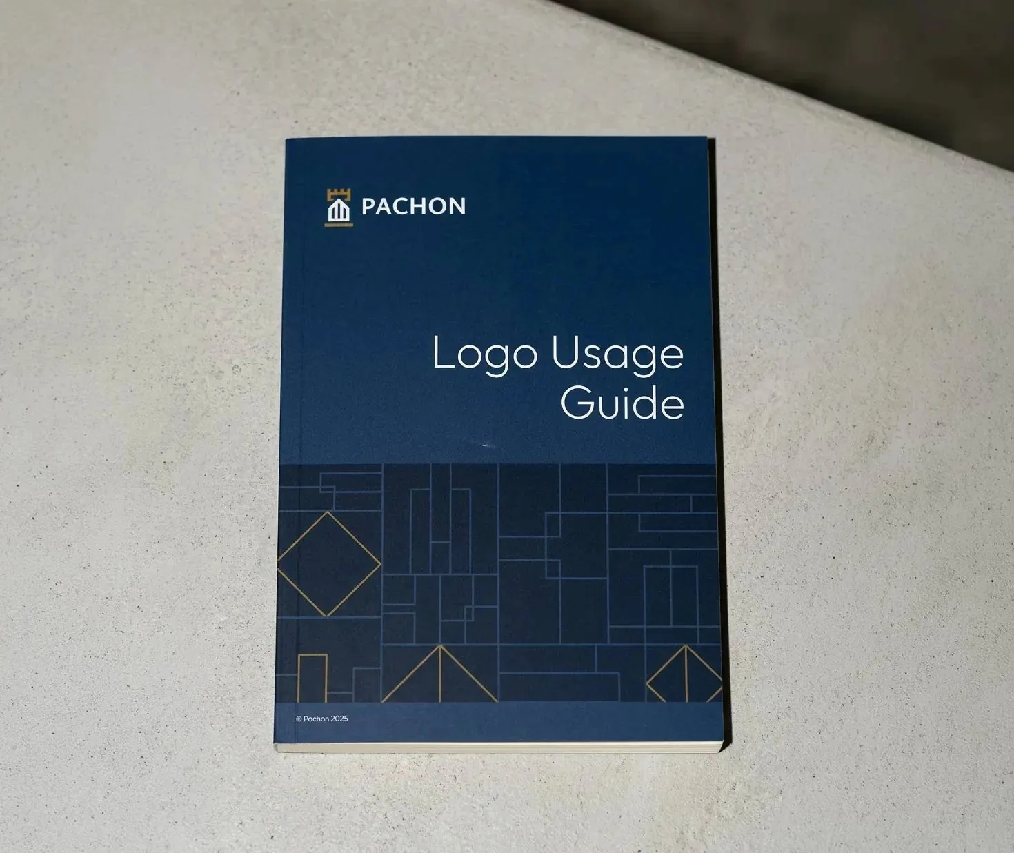 Pachon Logo Usage Guide cover in navy and gold